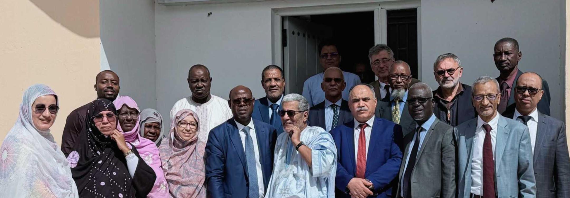 Group shot of NPM team outside their office